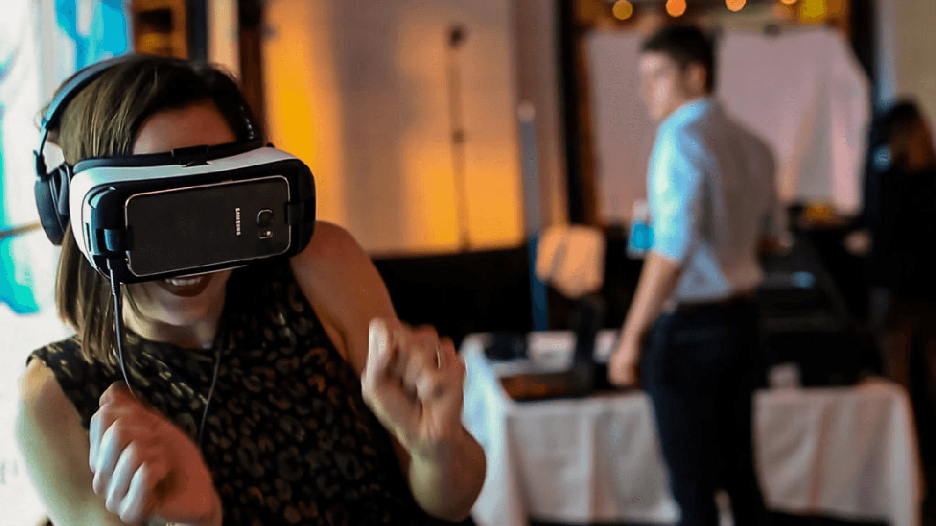Woman wearing a VR headset at an immersive experience evening