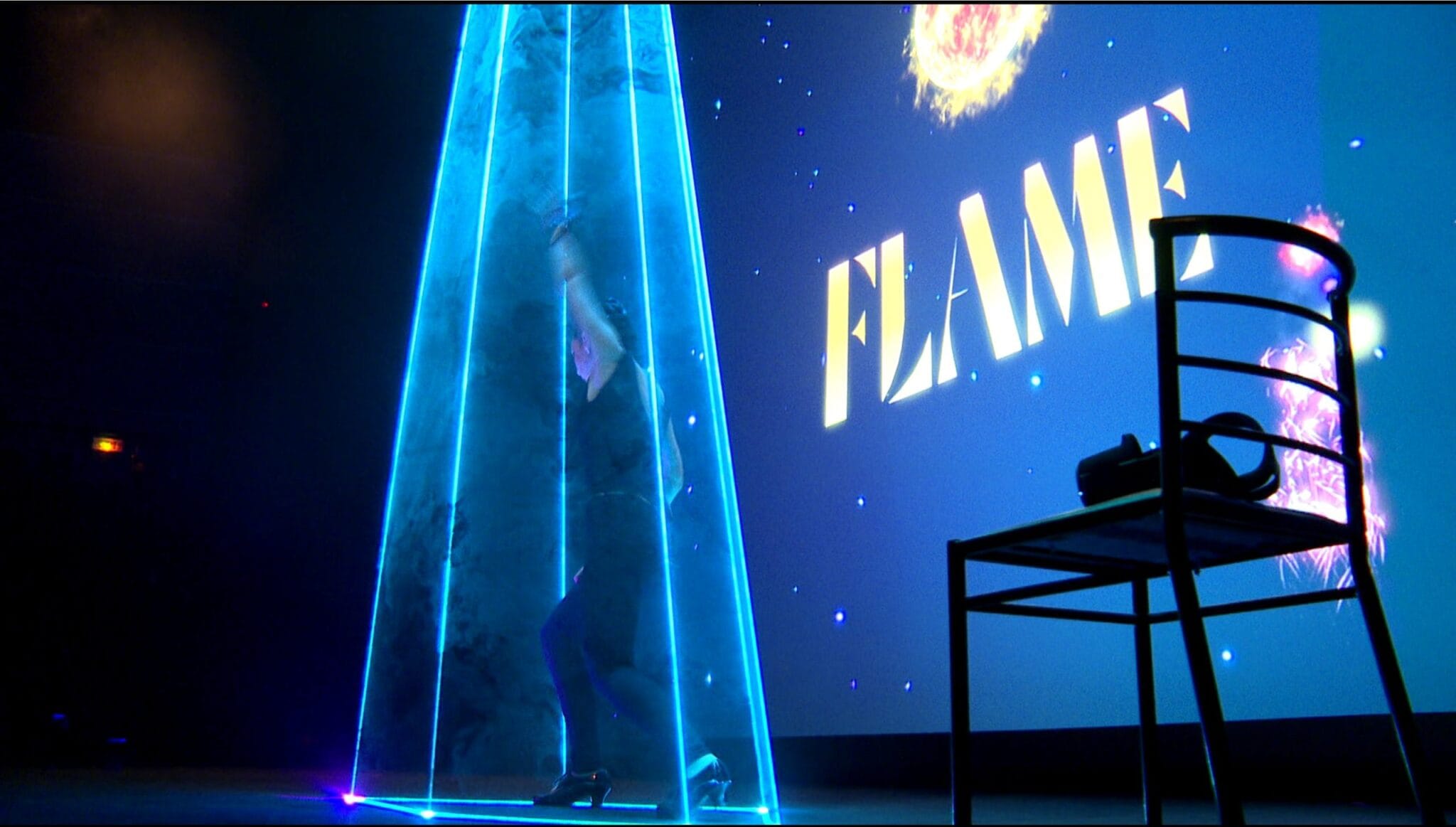 Flamenco dancer under a beam of light, Flame mixed reality show