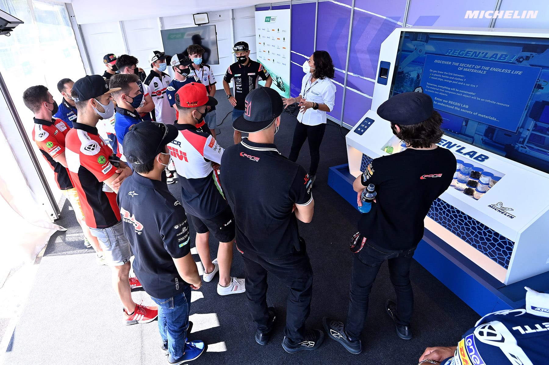 MotoGP riders discovering the Michelin Regen'Lab interactive model at the Catalan Grand Prix