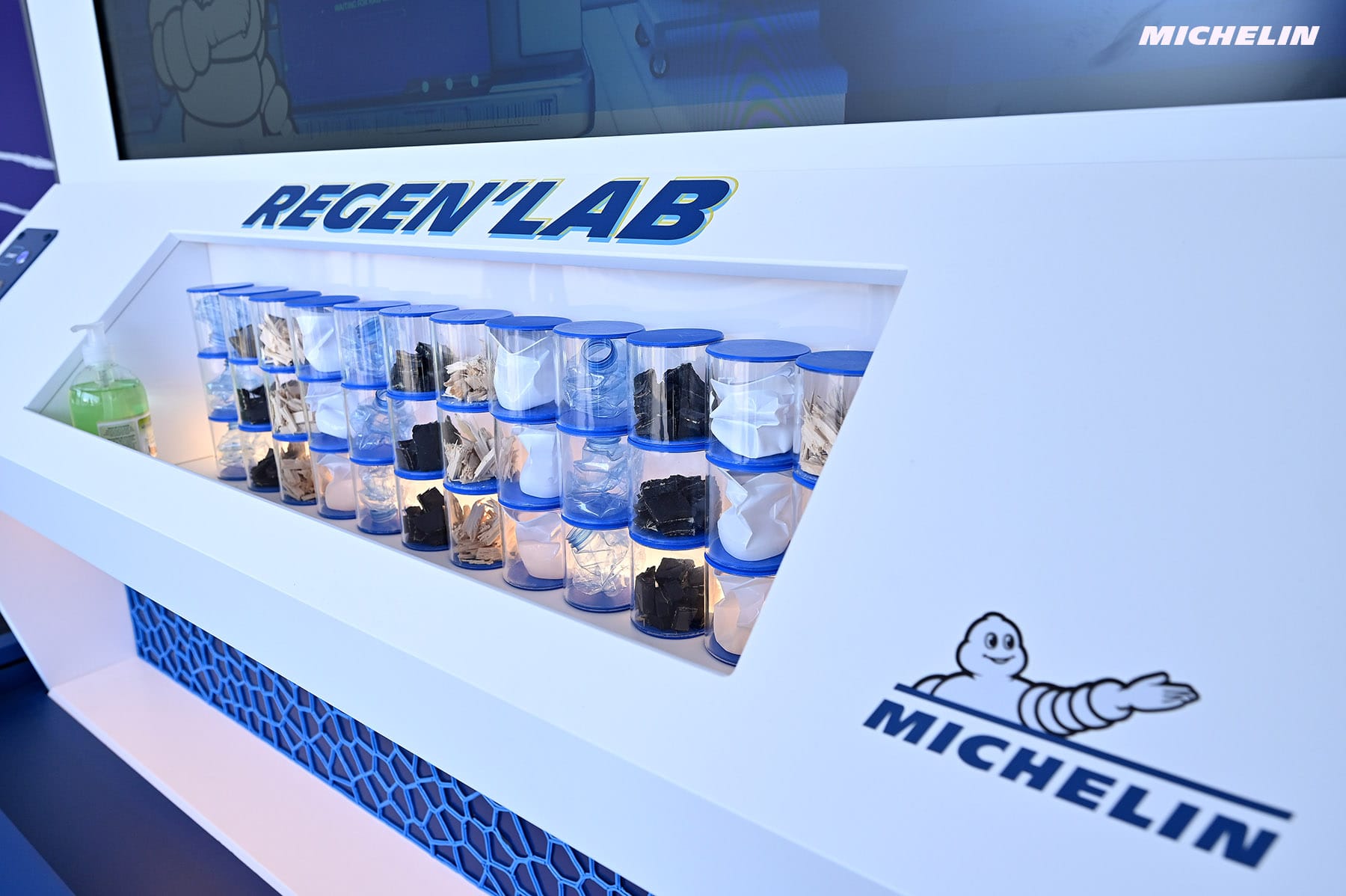 Michelin Regen'Lab model with jars of recycled materials