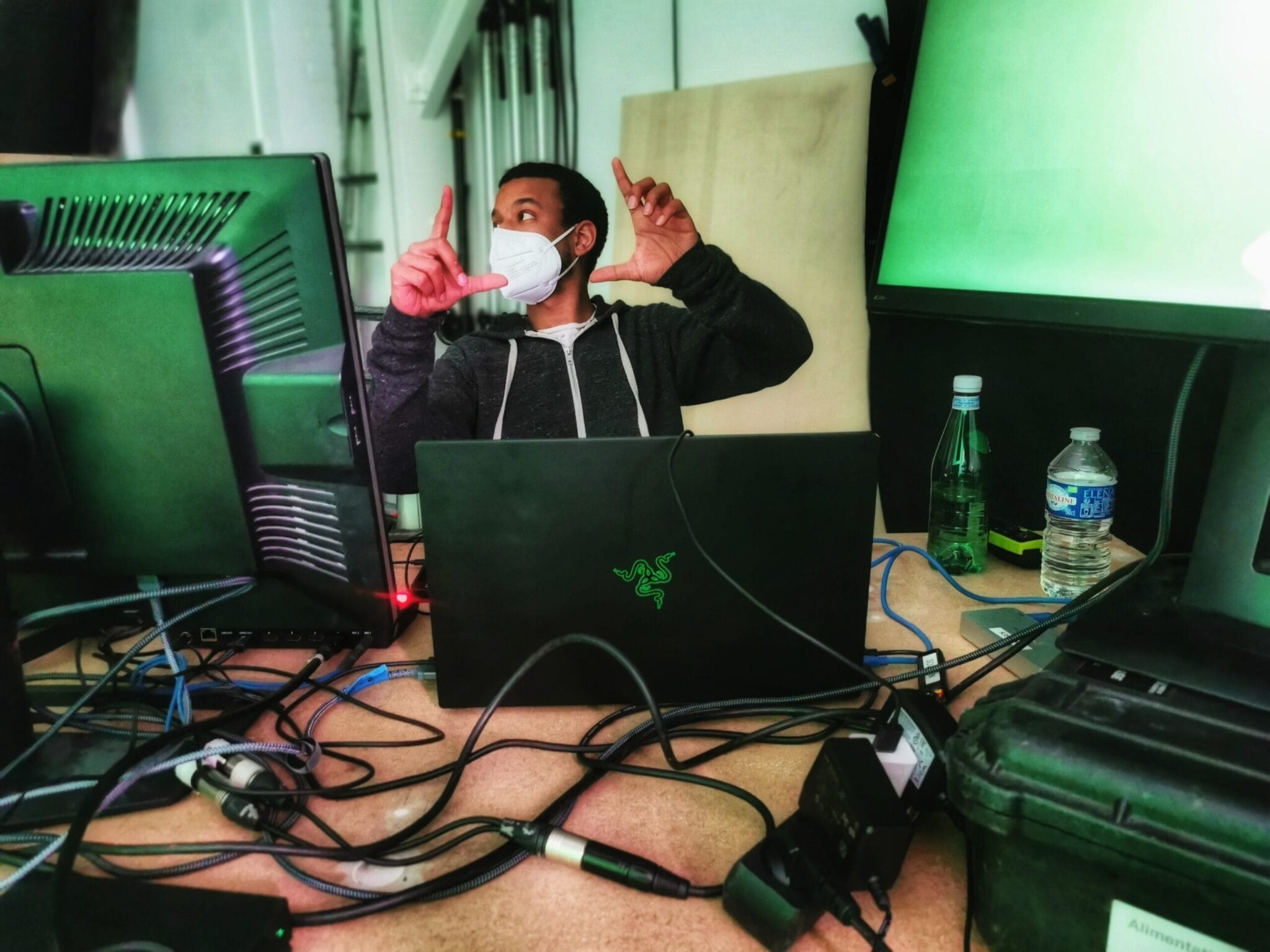 Technician framing a shot with his fingers in the SoWhen? virtual production studio
