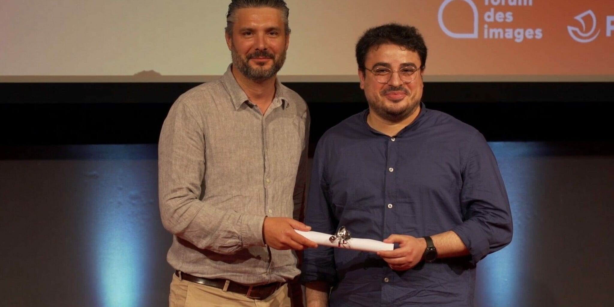 Mathieu Pradat and Mohamed Marouene receiving the Taiwan XR residency award at NewImages Festival