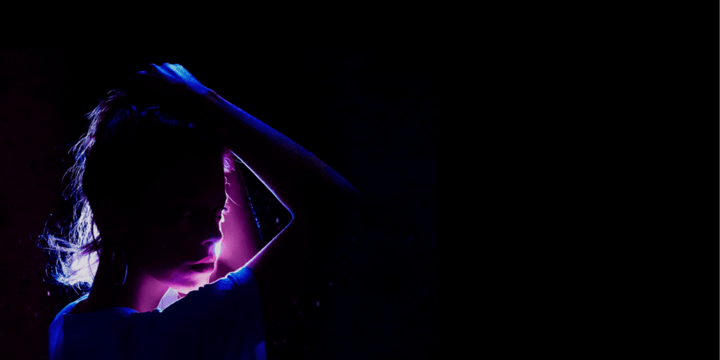 Silhouette of a woman lit in purple, 360° film "Lifeline"