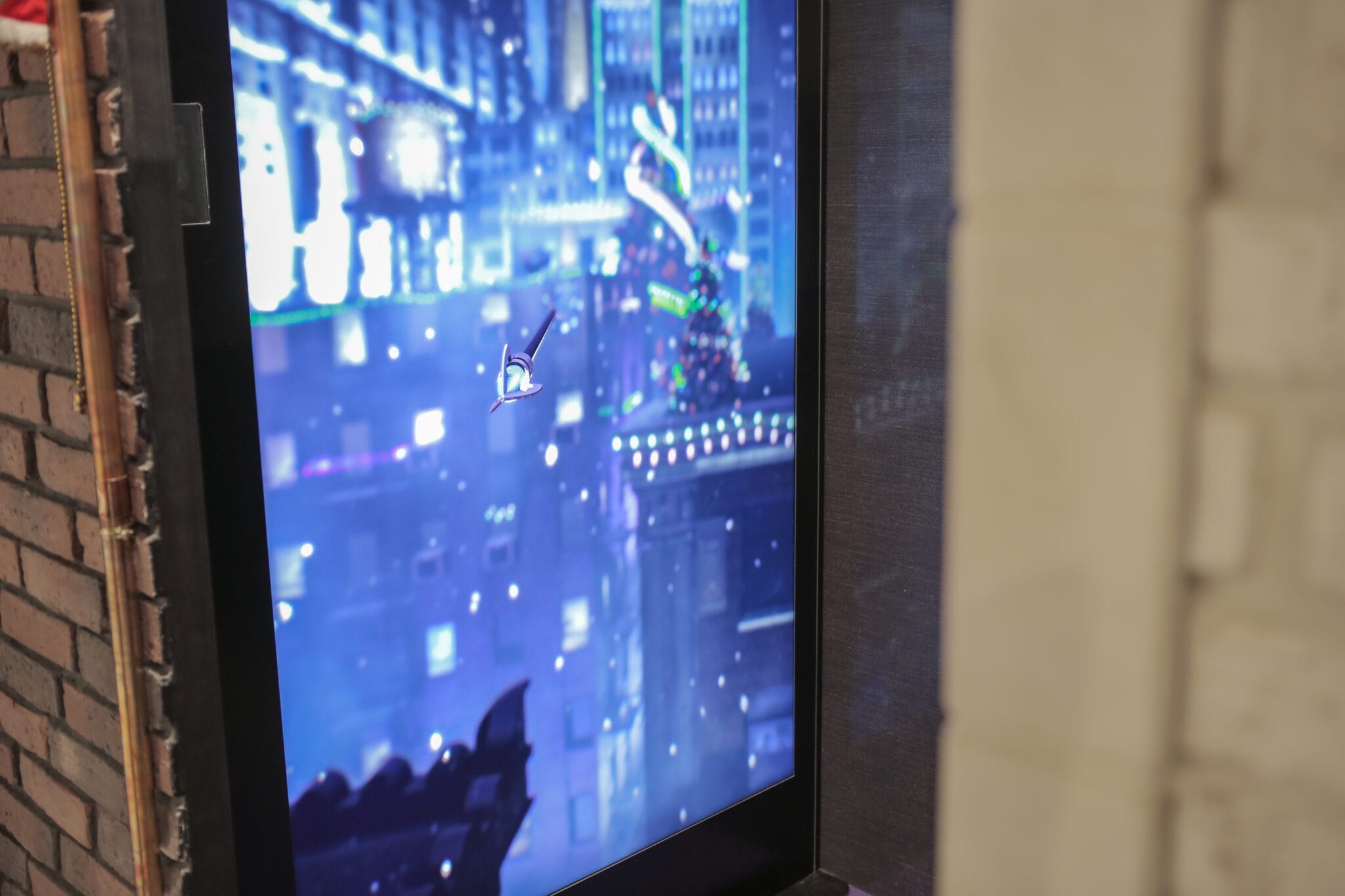Hawkeye interactive kiosk screen showing New York at night in augmented reality