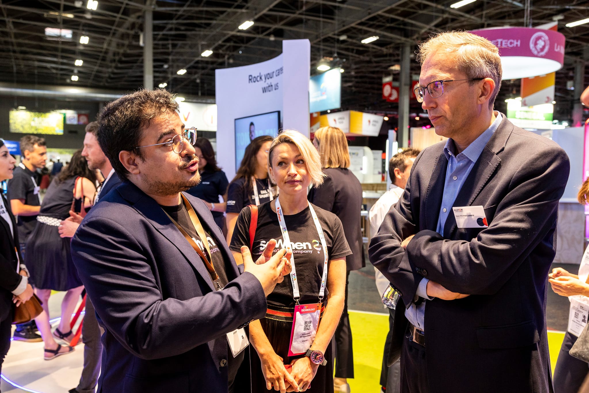 Mohamed Marouene and Alexandra de Tournemire talking with Henri Poupart-Lafarge at VivaTech