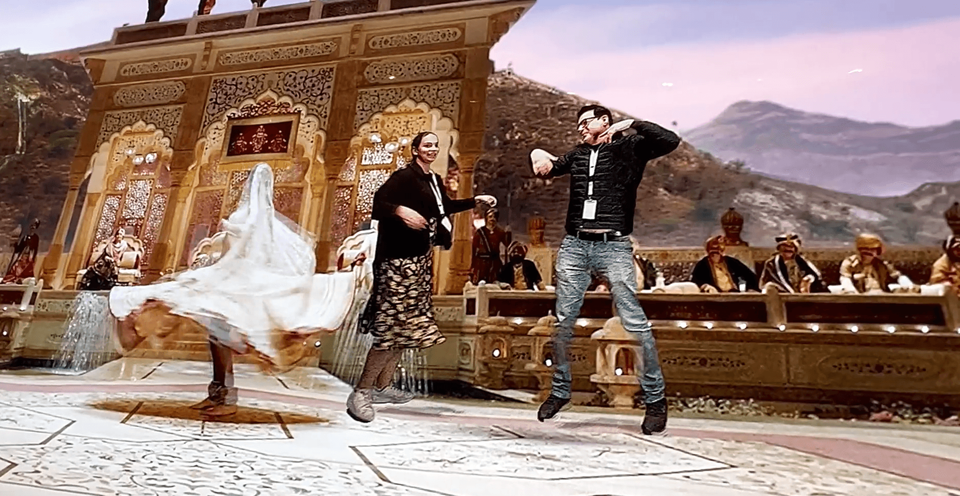 Visitors dancing keyed into a Bollywood scene, virtual production at Louvre Abu Dhabi