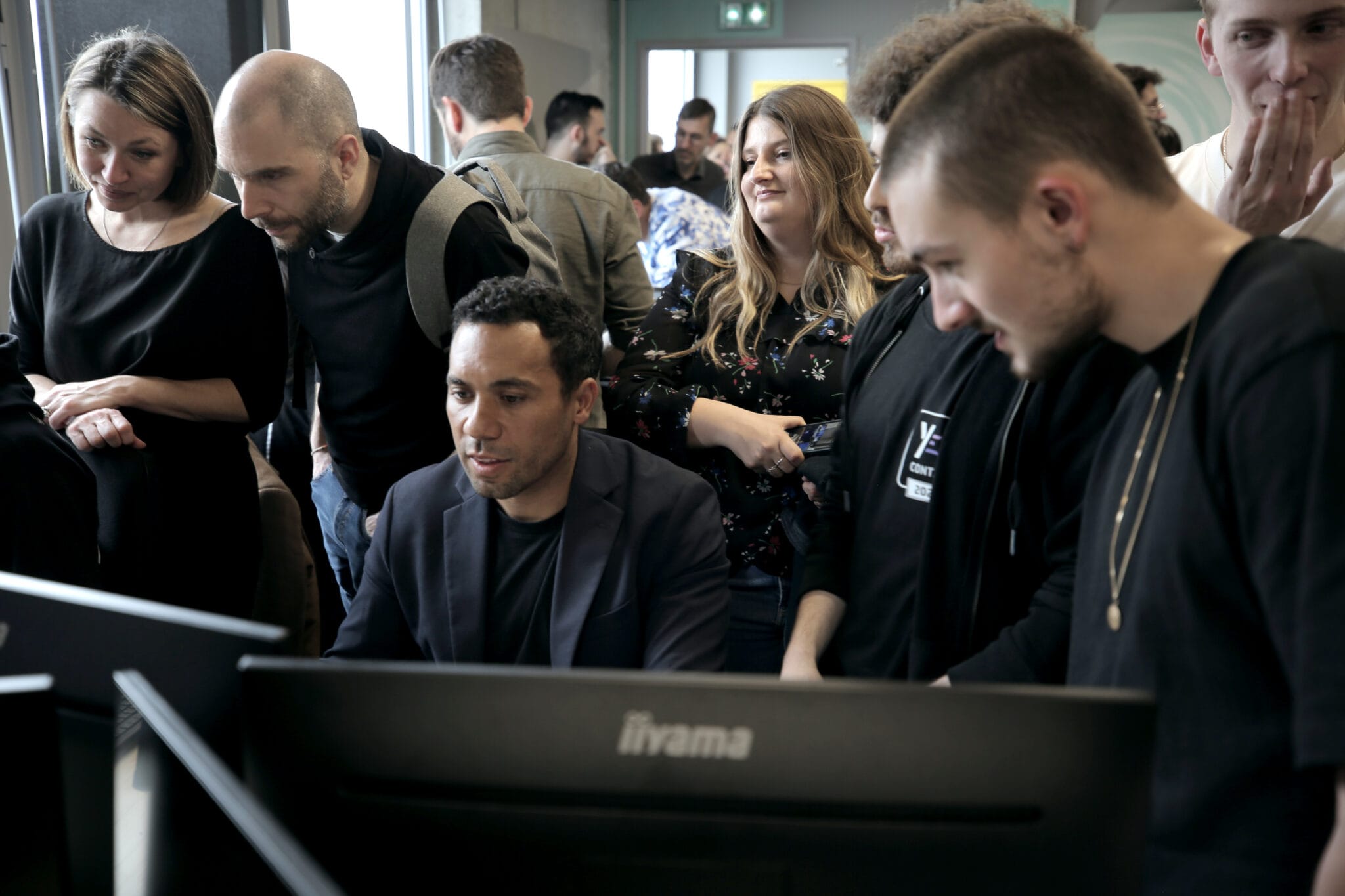 Jury members from L'Oréal, SoWhen? and Stellantis testing the students' Fortnite games