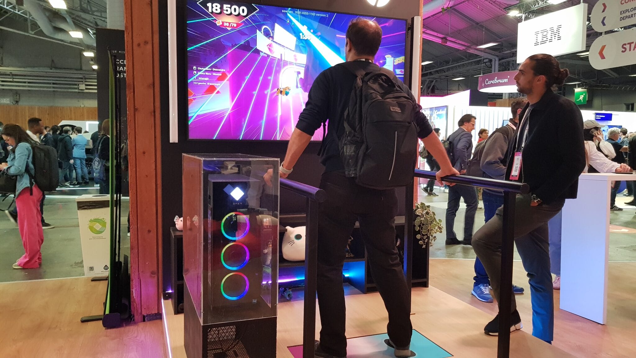 People playing HP's Fortnite game on the phygital kiosk, VivaTech