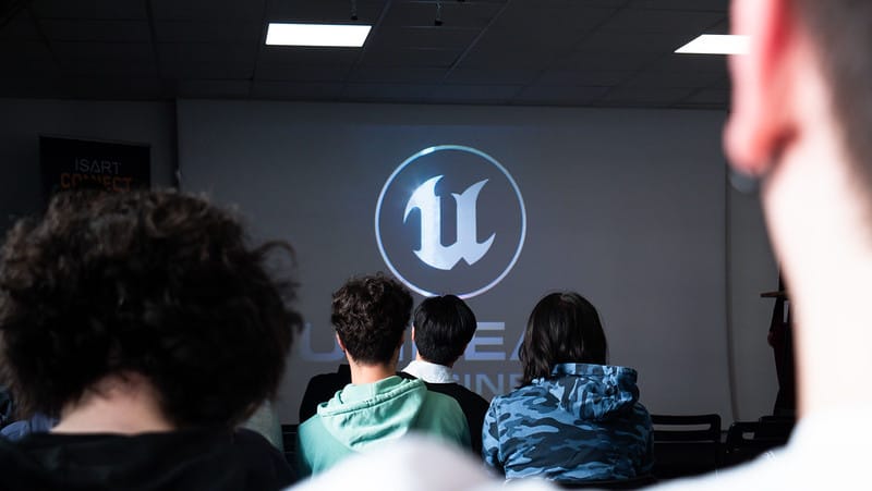 Audience in front of the Unreal Engine logo during a presentation